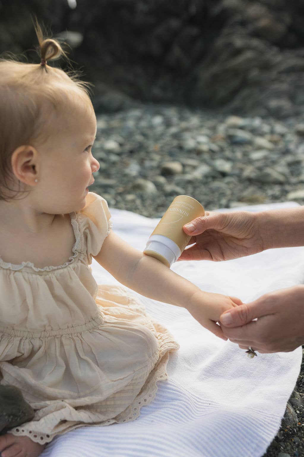 Kids Sun Balm in hand — safe natural sunscreen for kids Canada